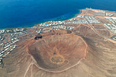 aerial view taken by drone of the Caldera Montana Roja Volcano, Playa Blanca, Lanzarote, Canary Island, Spain, Europe
