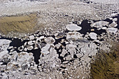 Aerial ice patterns along the Hudson Bay coast near Churchill, Manitoba, Canada.