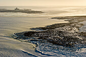 Aerial ice patterns along the Hudson Bay coast near Churchill, Manitoba, Canada.