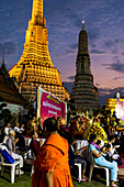 Buddhist ceremony at sunset in Wat Arun temple