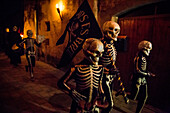 Verges, a small town in the Northeast of Catalonia (Spain), during Easter celebrates the Procession of Verges with skeletons dancing on the sound of a drum, Roman soldiers, known as the 'Manages', and a representation of the life and crucifixion of Jesus Christ. The Procession features the Dance of Death, a tradition from the Middle Age associated with epidemics and plagues and the only one remaining in Spain. Ten skeletons dance to the beat of a drum to remember that no one is exempt of death. The backdrop of the medieval walls and towers of Verges is key to this macabre staging.