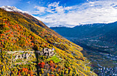 Ancient village of Roncaiola in autumn with view on the valley. Tirano, Valtellina, Lombardy, Italy, Europe.