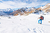 Hiker at Col de Saint Marcel, Grauson valley, Cogne valley, Valle d'Aosta, Italian Alps, Italy