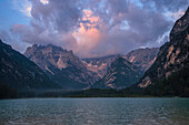 Italy, Sud Tirol, Lake Landro and mount Cristallo at sunrise in Summer