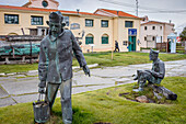 Prisoners sculptures and facade of El Presidio, the former prison, now the Maritime museum and Presidio museum. Ushuaia, Tierra del Fuego, Patagonia, Argentina