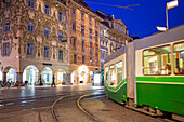 Tram, Hauptplatz, in background Luegg House, Graz, Austria
