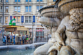 The famous Bitzinger Wurstelstand kiosk and Danubius fountain,also called Albrecht fountain, in front of Albertina Museum, Albertinaplatz, Vienna, Austria