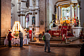 Praying, San Francisco church, Potosi, Bolivia