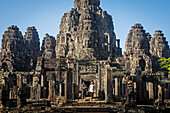 Tourists, in Bayon temple, Angkor Thom, Angkor, Siem Reap, Cambodia