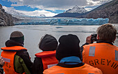 Grey Glacier and Hikers in a Catamaran, crossing Grey lake between Refugio Grey and Hotel Lago Grey, Torres del Paine national park, Patagonia, Chile