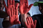 Teenagers who were child soldier during their childhood that belonged to armed groups of the Colombian conflict. The international day against the child soldier is known worldwide also as the day of the red hand, colombia