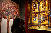 Visitors and Reproductions of pages from the Book of Kells, inThe Old Library, in Trinity College, Dublin, Ireland