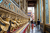 Tourists, at Emerald Buddha Wat Phra Kaeo temple, Grand Palace, Bangkok, Thailand