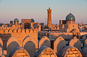 Skyline, Kalon minaret and mosque. And Mir-i-Arab medressa, from Ark, Bukhara, Uzbekistan
