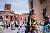 Flower offering parade,People with Floral tributes to `Virgen de los desamparados´, Fallas festival,Plaza Decimo Junio Bruto,Valencia