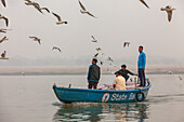 Fishermen, in Ganges river, Varanasi, Uttar Pradesh, India.
