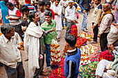 Men Haggling. The flower market,Varanasi, Uttar Pradesh, India
