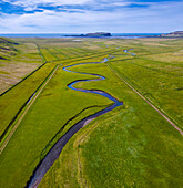 Aerial view of Dyrholaey during summer, Vík í Mýrdal, Southern Iceland, Iceland, Northern Europe