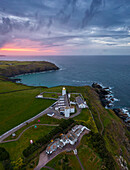 Aerial view of Lizard Point Lighthouse at sunrise, Lizard Point, Cornwall, United Kingdom, Northern Europe