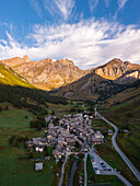 Aerial view of Pontechianale at sunrise during summer, Alpi del Monviso, Cuneo, Piedmont, Italy, Southern Europe