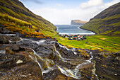 Small waterfall and Tjørnuvik village, Sunda municipality, Streymoy, Faroe Islands, Denmark, Scandinavia