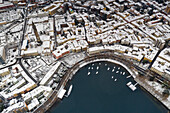 Aerial view of Lecco Bay in a snowy day, Lecco, Lecco province, Lombardy, italy