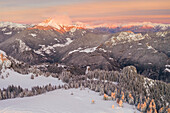 Aerial view of the Pizzo Camino covered in snow at sunset from Mount Scanapà. Castione della Presolana, Val Seriana, Bergamo district, Lombardy, Italy.