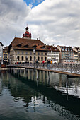 View of Lucerne Rathaus and the rathaussteg bridge on the Reuss river. Lucerne, canton of Lucerne, Switzerland.
