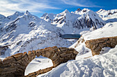 View of the Morasco lake and dam from the road to the Maria Luisa refuge and the high Formazza Valley. Riale hamlet, Riale, Formazza, Valle Formazza, Verbano Cusio Ossola, Piedmont, Italy.