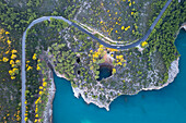 Aerial view of Grotta Sfondata cave on the coast near Vieste. Foggia province, Gargano National Park, Apulia, Italy.