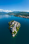Aerial view of San Giulio island and Lake Orta in the summer. Orta Lake, Province of Novara, Piedmont, Italy.