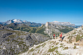 Falzarego Pass, Dolomites, province of Belluno, Veneto, Italy. Mountaineers approaching the via ferrata "Kaiserjaeger" to the Mount Lagazuoi