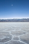 Moonshine over the salt desert at Badwater Basin, Death Valley National Park, California, USA