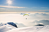 Paragliding in Brescia prealpi in winter season, Brescia province, Lombardy district, Italy, Europe.