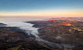 Panoramic aerial view of Alessandria hills with fog, Alessandria province, Piedmont, Italy, Europe.