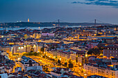 Lisbon, Portugal. View on the Ponte do 25 Abril bridge, Rossio Square