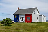 Wood house in acadian colors, new brunswick, canada, north america