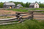 Fences in front of the robichaud house and farm built in 1846, historic acadian village, bertrand, new brunswick, canada, north america