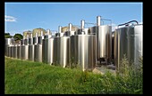 Stainless steel wine vats, vini services company, port of blaye, gironde, france