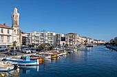 Chamber of commerce and traditional boats on the canal royal, sete, herault, occitanie, france