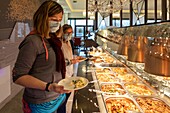 Autonomous residents in the restaurant, care home for adults with moderate mental disabilities, residence du moulin de la risle, rugles, eure, normandy, france