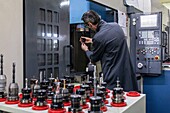 Salaried technician in front of his digital tower, manufacture of metal cutters for cutting tools, pelletier et jaminet company, l'aigle, orne, normandy, france