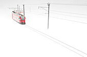 Bernina Express train in the pristine white snow at Bernina Pass during a blizzard, Graubunden canton, Engadine, Switzerland