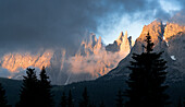 Fog at sunrise covering Popera group mountains and Selvapiana in summer, Sesto Dolomites, South Tyrol, Italy