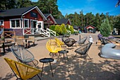 Restaurants in Nagu harbour or Nauvo island in Väståboland in Pargas in Southwest Finland Turku archipelago. The archipelago ring road or Saariston rengastie is full of things to see, do and do. The Archipelago Trail can be taken clockwise or counter clockwise, starting in the historical city of Turku, and continuing through rural archipelago villages and astonishing Baltic Sea sceneries. The Trail can be taken from the beginning of June until the end of August.
