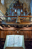 Choir and organ inside the cloister of the La Colegiata de Santa Juliana church, Santillana del Mar, Cantabria, Spain