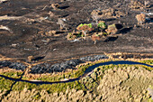 Aerial view of the Okavango Delta, after a bushfire. Botswana.