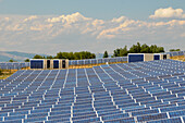 A field filled with solar panels at a solar power plant. Les Mees, Provence, France.