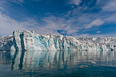 Lilliehook Glacier reflects on arctic waters. Lilliehookjorden, Spitsbergen Island, Svalbard, Norway.