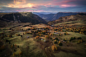 Aerial shot of an autumn sunset at Alpe di Siusi, South Tyrol, Italy